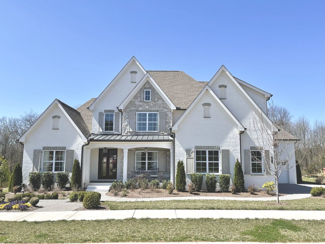 Front exterior of a home in the Tiburon community, located in Brentwood, TN (Image 2). Front exterior of a home in the Tiburon community, located in Brentwood, TN (Image 2).