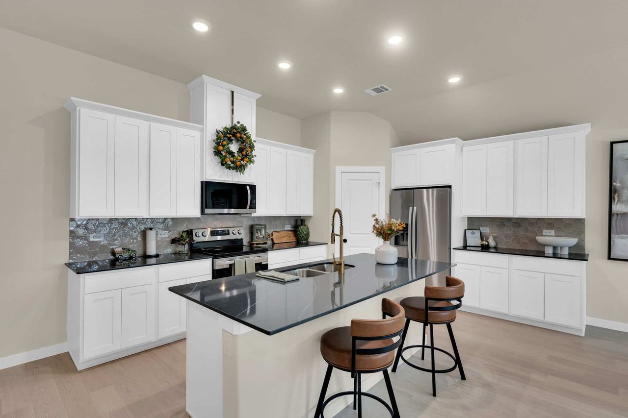 Furnished interior in a model home at Hadley Farms in Godley (Image 2).