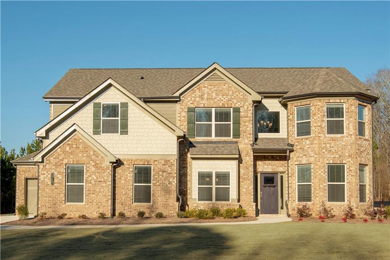 Front exterior of a home in the Sierra Lake community, located in Cumming, GA (Image 2).