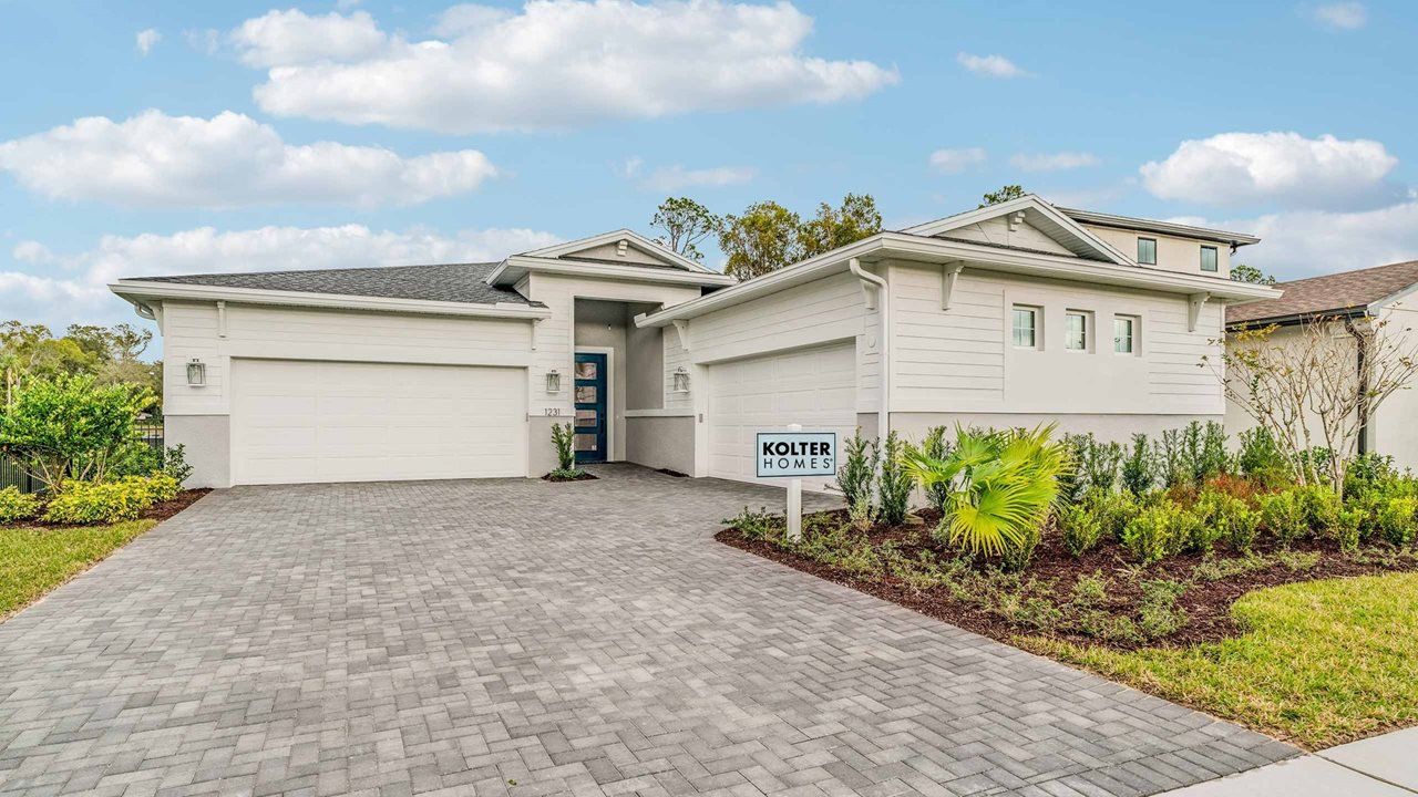 Front exterior of a home in the Woodland Preserve community, located in Parrish, FL (Image 2).