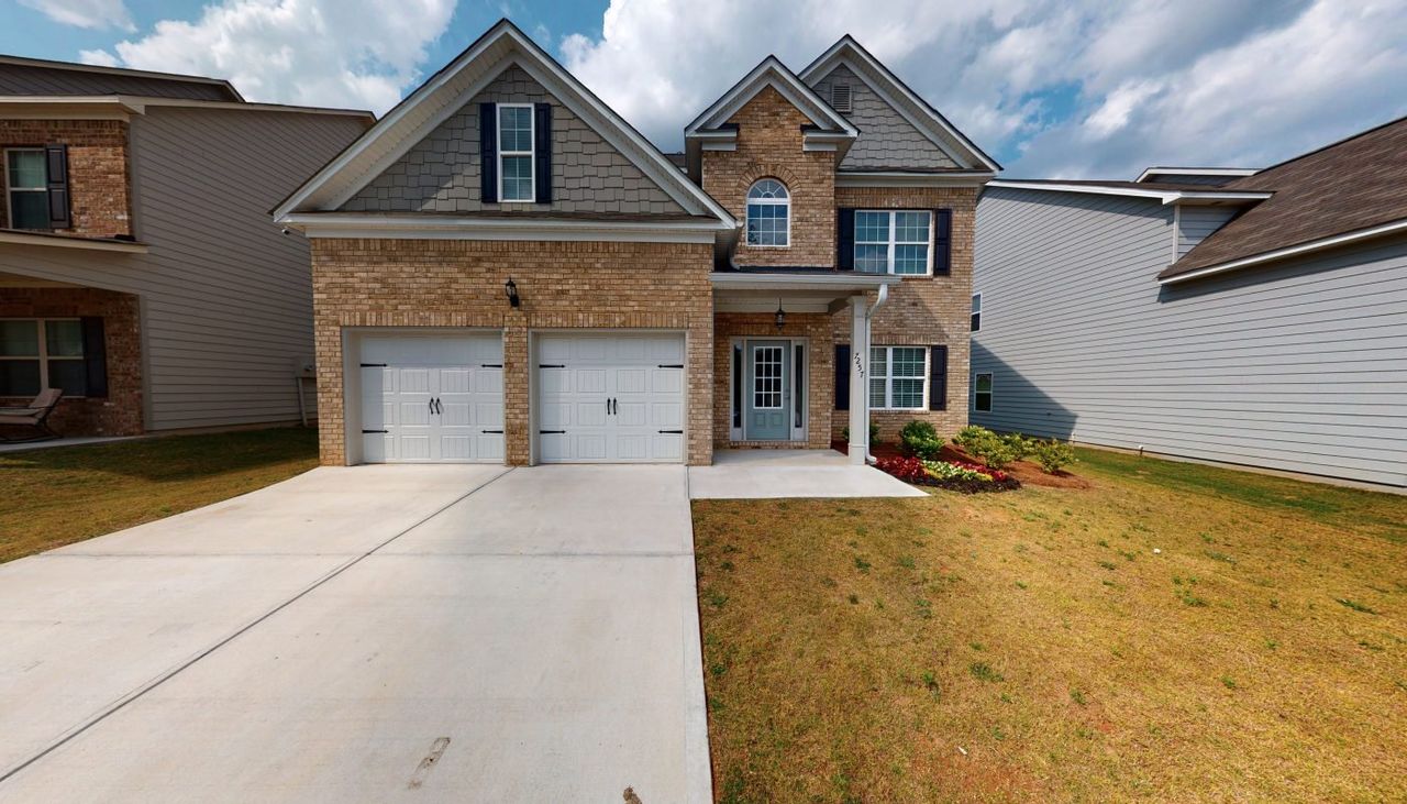 Front exterior of a home in the Old Jonesboro Landing community, located in Fairburn, GA (Image 2).