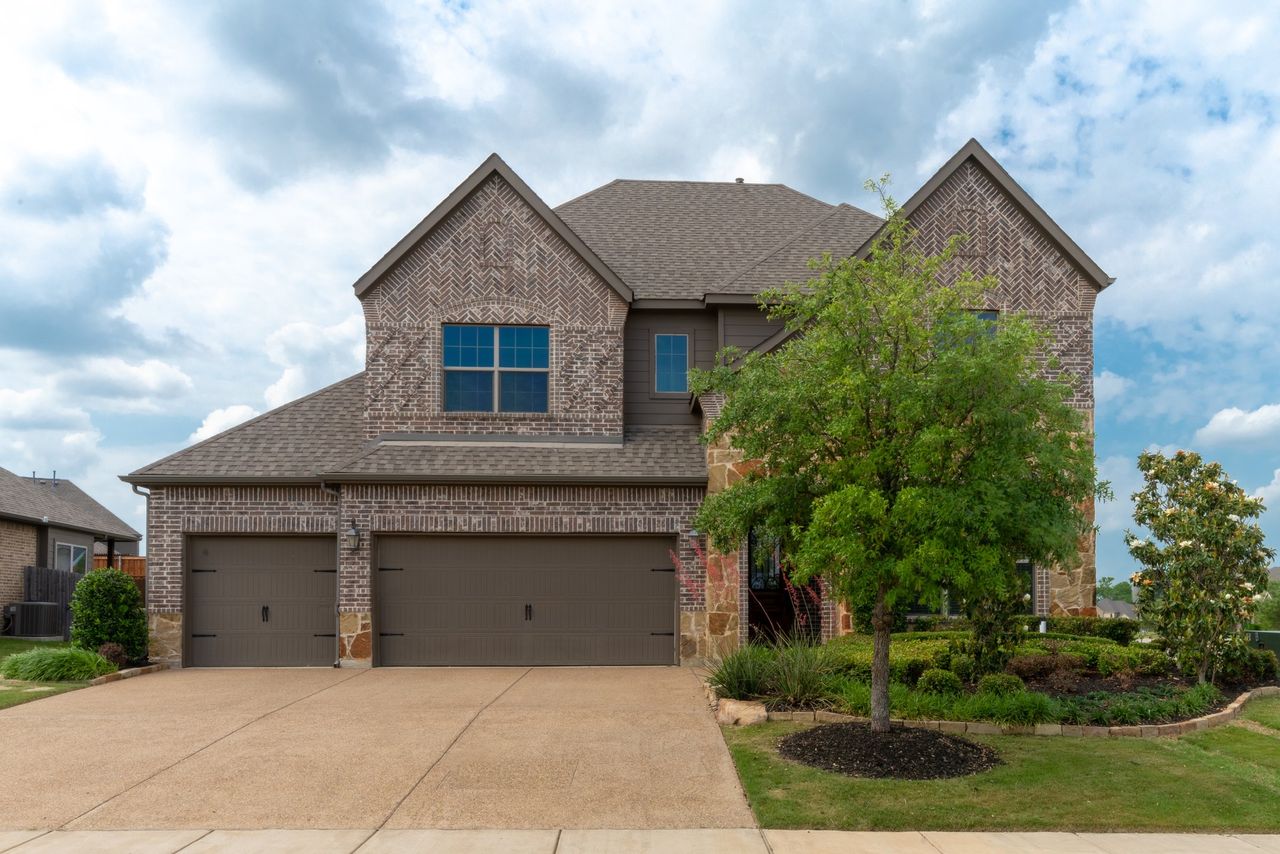 Front exterior of a home in the Robinson Ridge community, located in McKinney, TX (Image 2).