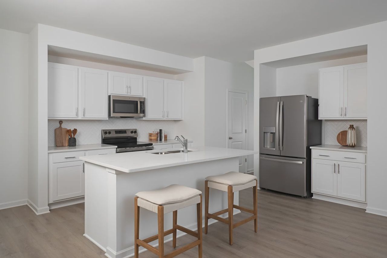 Furnished interior in a model home at Langston Reserve - Townhomes in Cartersville (Image 2).