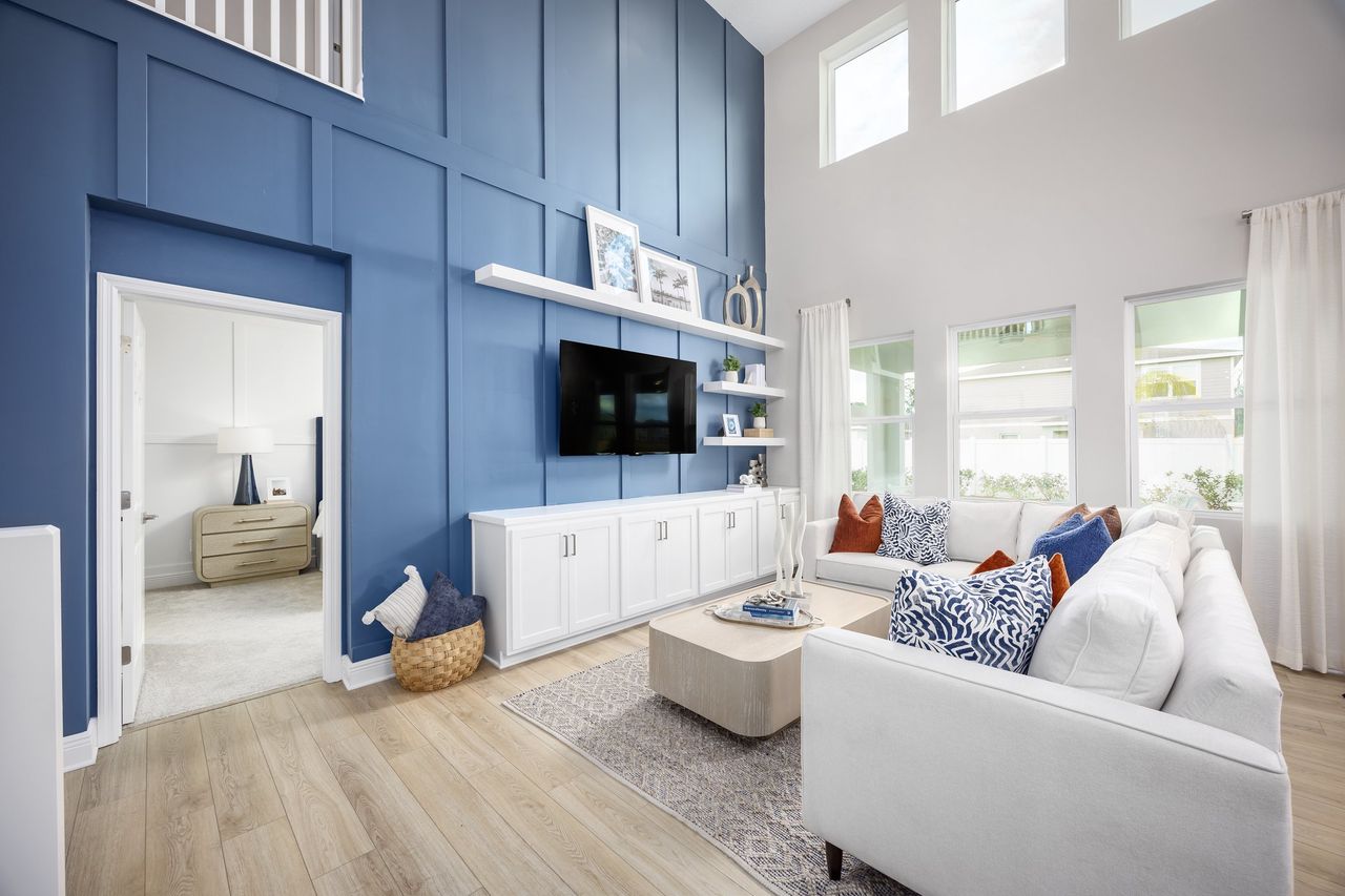 Furnished interior in a model home at Cypress Reserve in Clermont (Image 2).