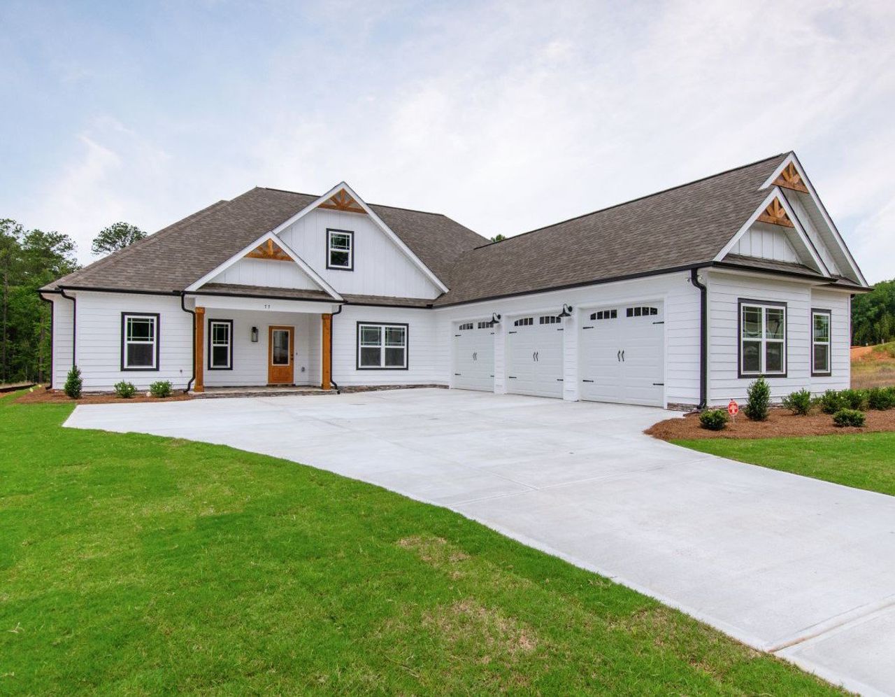 Front exterior of a home in the Twelve Parks community, located in Sharpsburg, GA (Image 2).