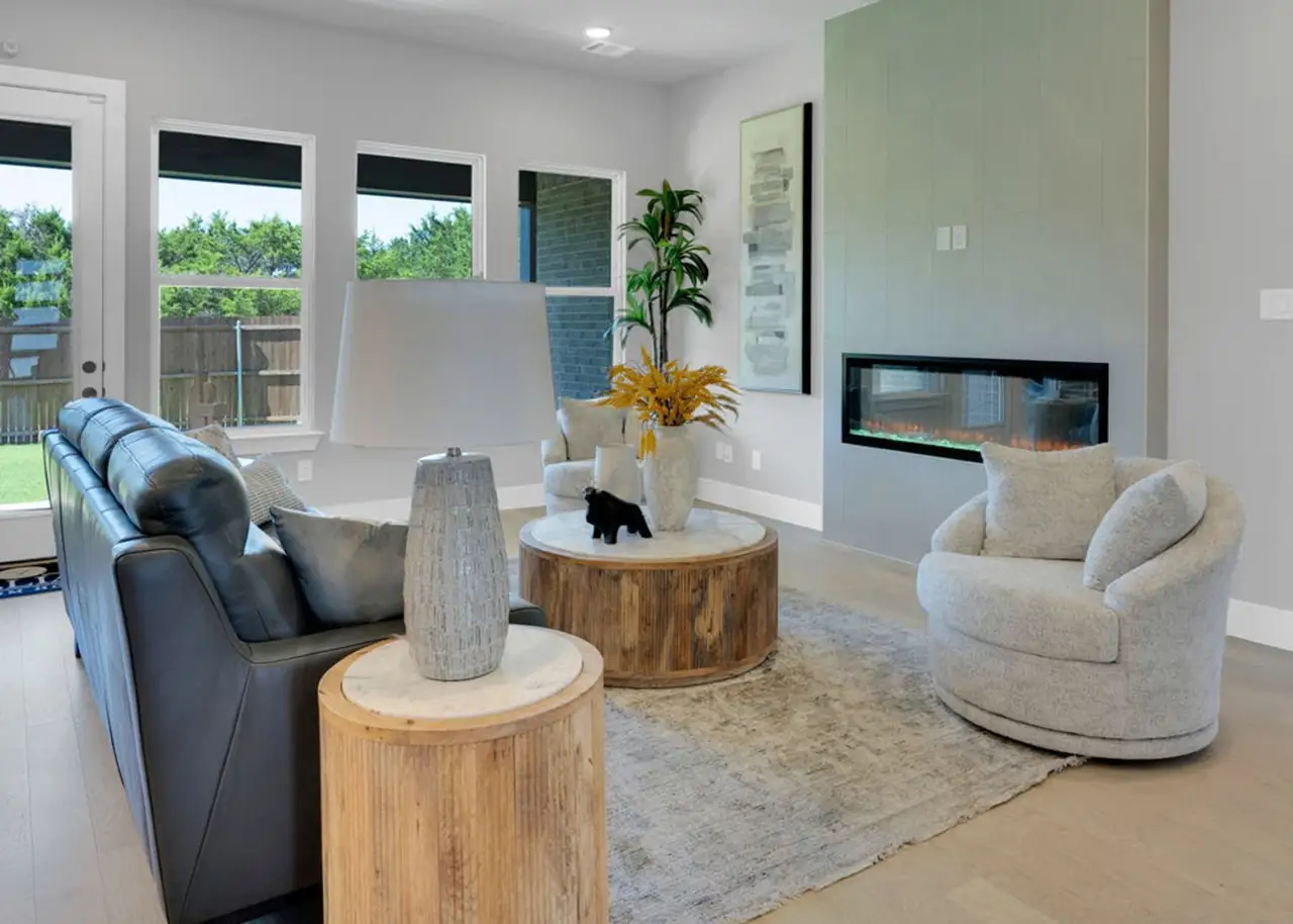 Furnished interior in a model home at Ten Mile Creek in DeSoto (Image 2).