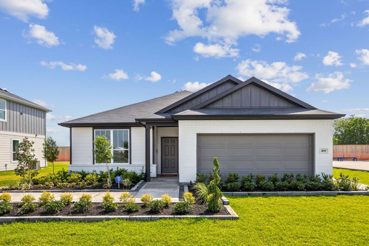 Front exterior of a home in the Pinara Pines community, located in Conroe, TX (Image 2). Front exterior of a home in the Pinara Pines community, located in Conroe, TX (Image 2).