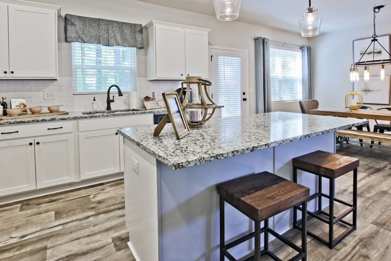 Furnished interior in a model home at The Bend At Pettit Creek in Cartersville (Image 2).
