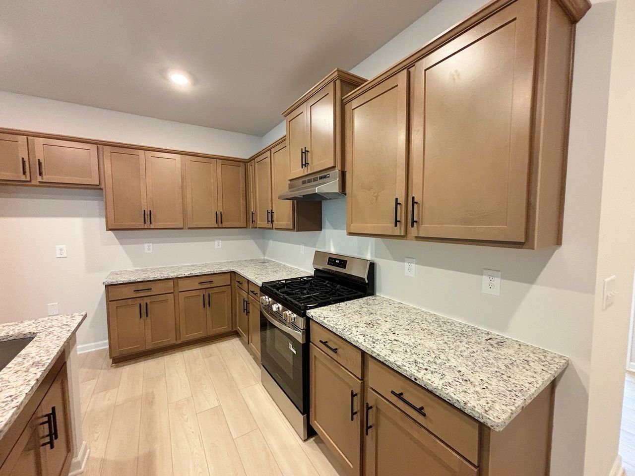 Furnished interior in a model home at Magnolia Trace in Flowery Branch (Image 2).