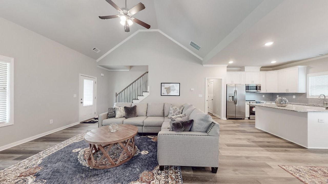 Furnished interior in a model home at Ellington Farm in Statham (Image 2).