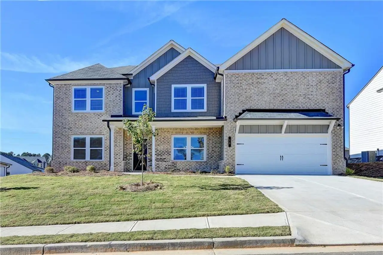 Front exterior of a home in the Mountain Valley community, located in Hoschton, GA (Image 2).