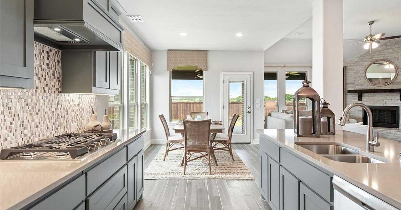 Furnished interior in a model home at Rosemary Fields in Godley (Image 2).