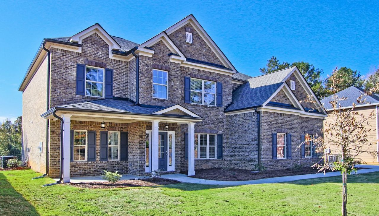 Front exterior of a home in the Fairways at Durham Lakes community, located in Fairburn, GA (Image 2). Front exterior of a home in the Fairways at Durham Lakes community, located in Fairburn, GA (Image 2).