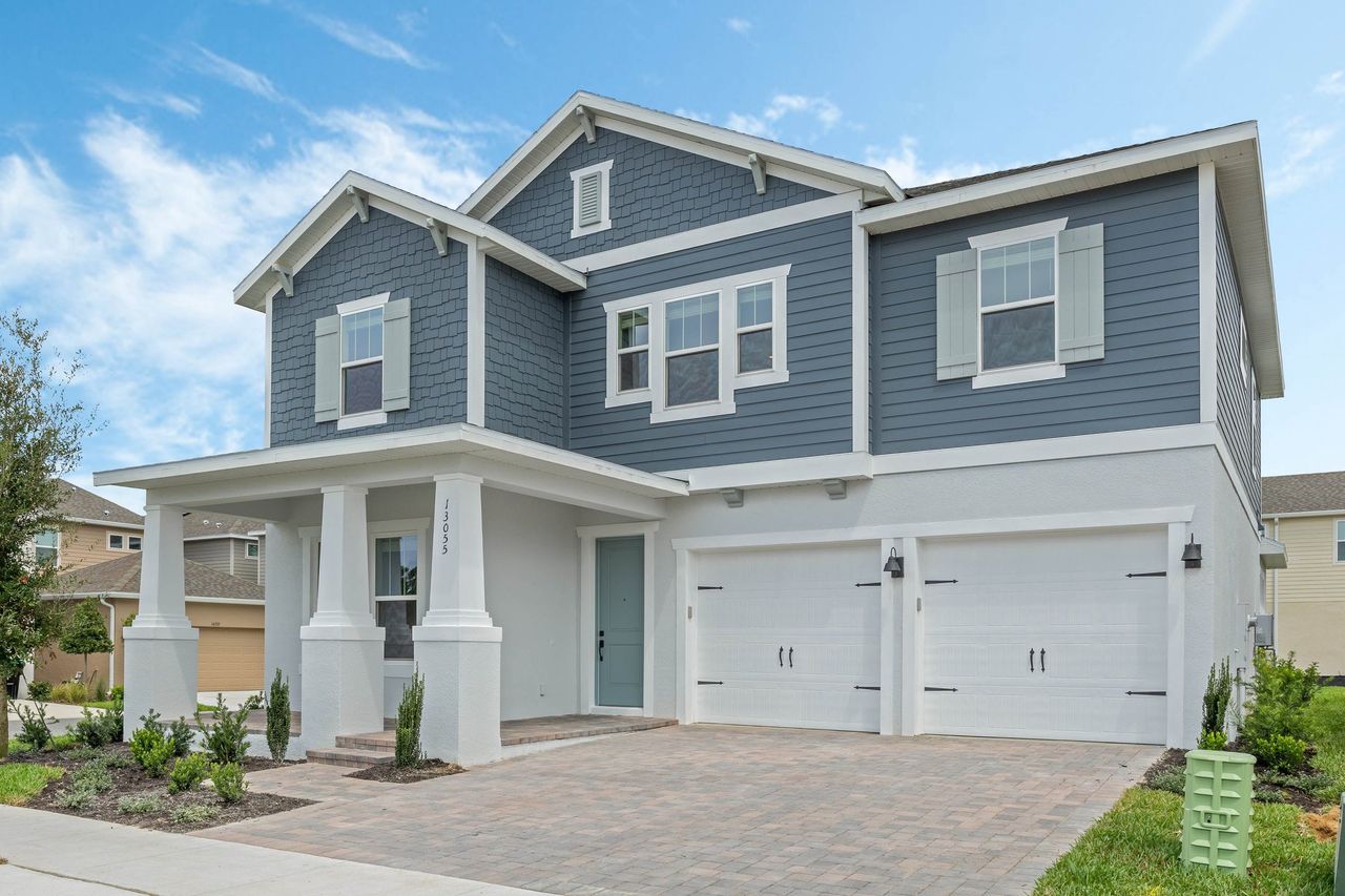 Front exterior of a home in the Grassmere community, located in Zellwood, FL (Image 2).