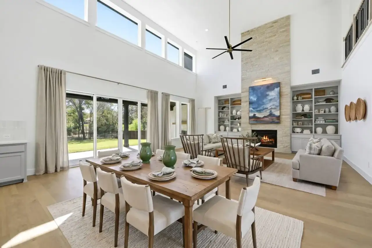 Furnished interior in a model home at Double L Ranch in Dripping Springs (Image 2).