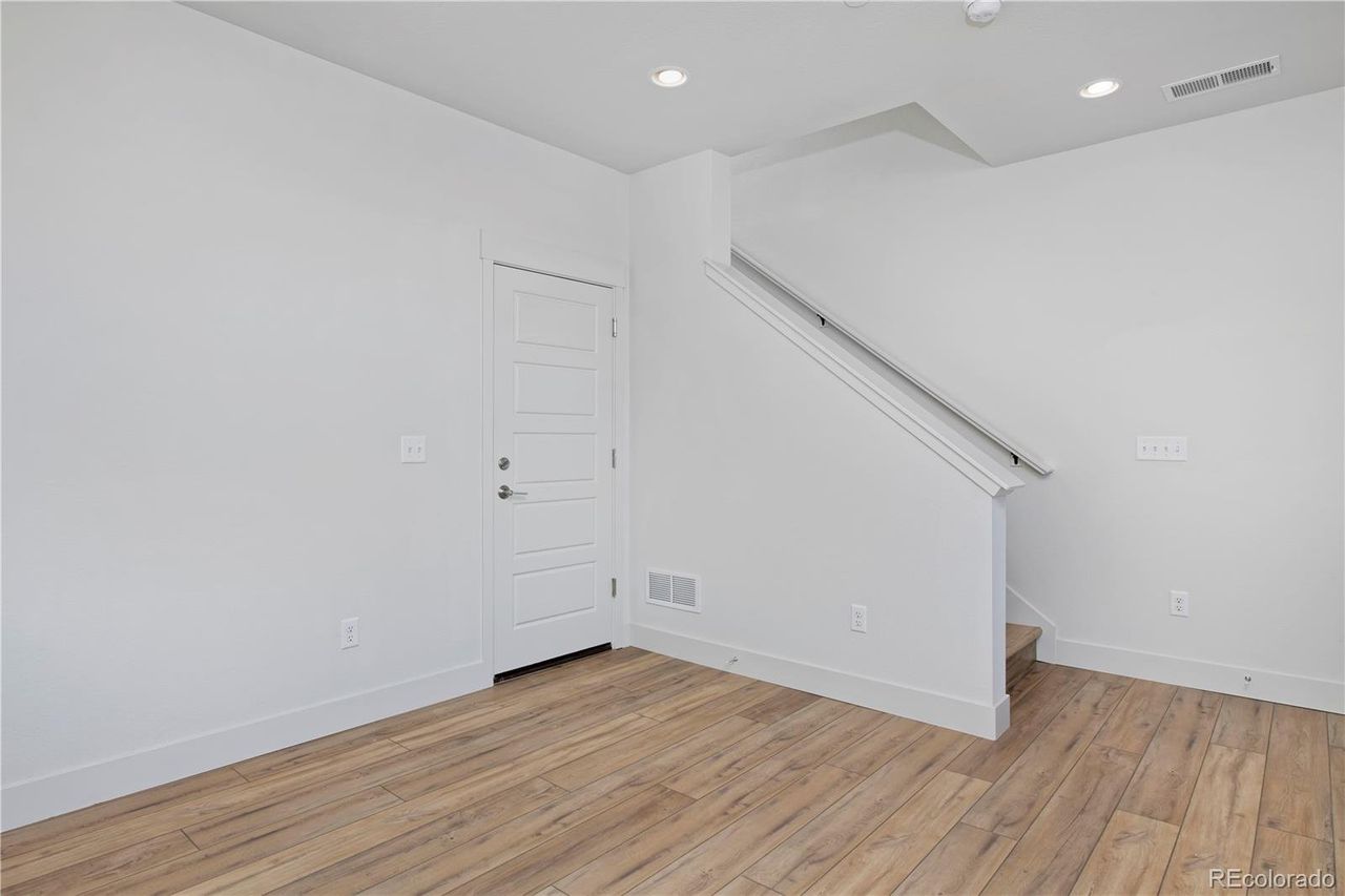 Spacious, unfurnished interior of a new home in Lyric at RidgeGate, Lone Tree (Image 2).