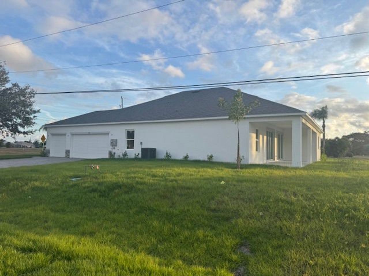 Exterior details and patio area of a home in Deep Creek, Punta Gorda (Image 2).