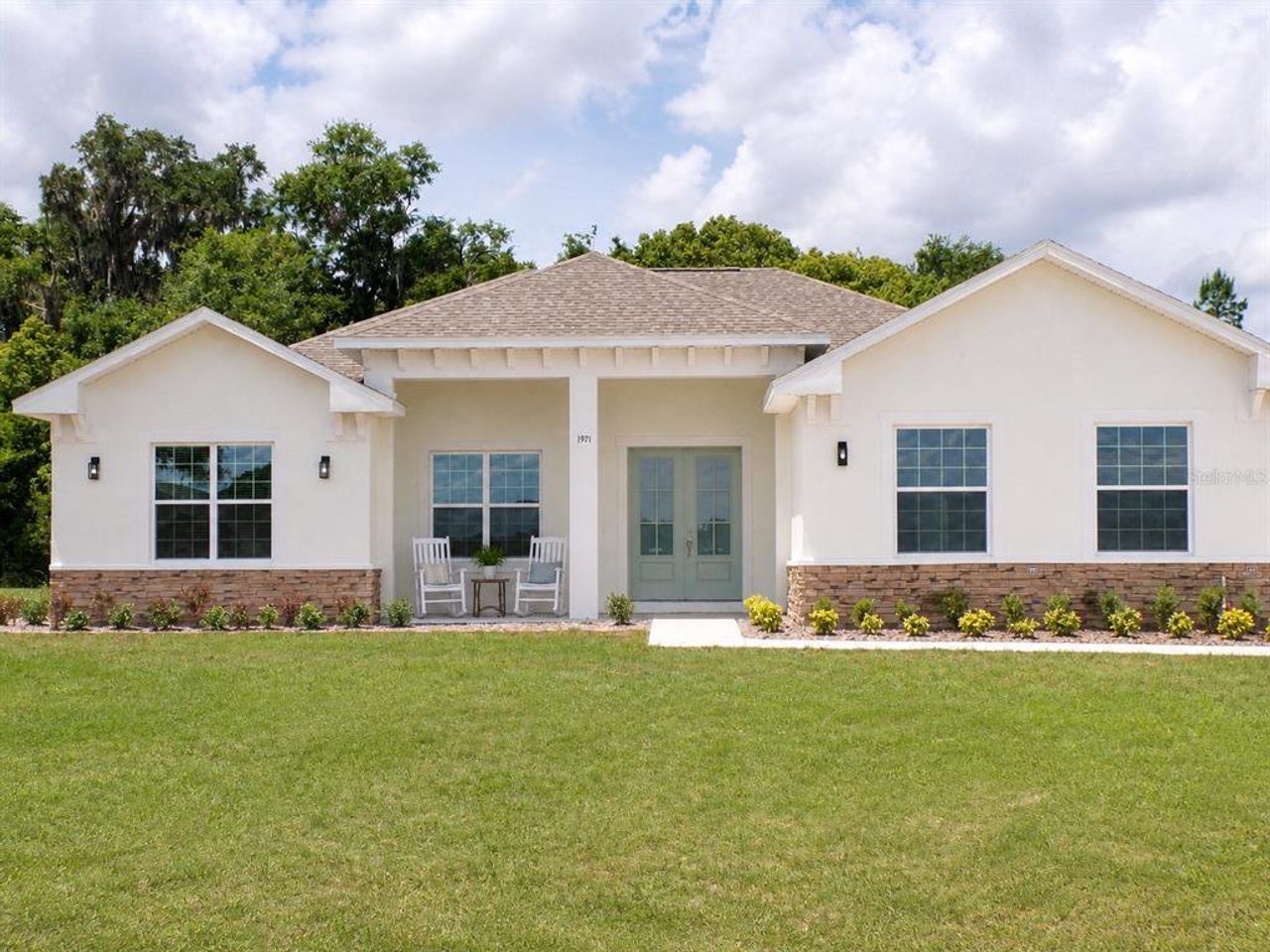 Front exterior of a new home in , Ocala, FL, highlighting curb appeal (Image 2).