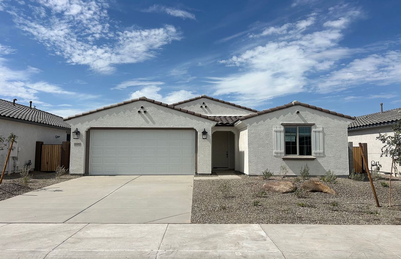 Front exterior of a new home in Alamar, Avondale, AZ, highlighting curb appeal (Image 2).