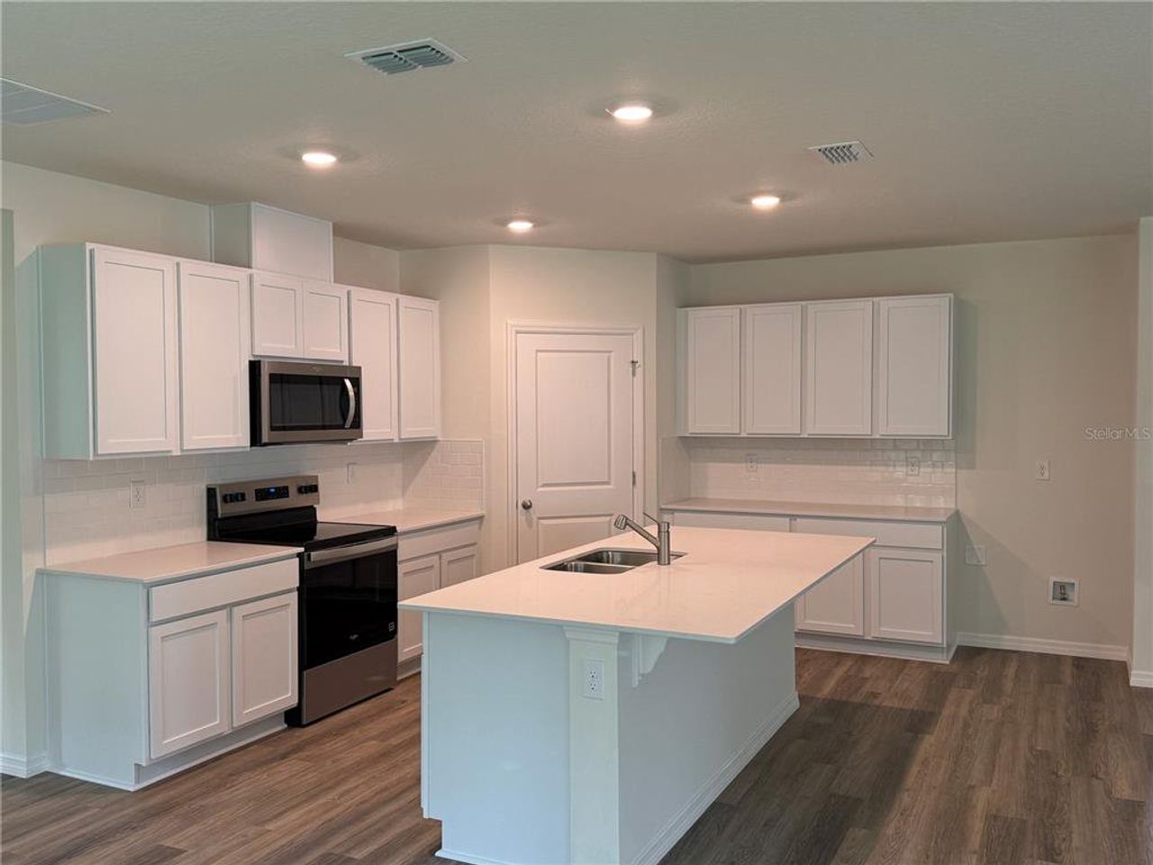 Furnished interior view inside a new home in Wexford Cove, Ormond Beach (Image 2).