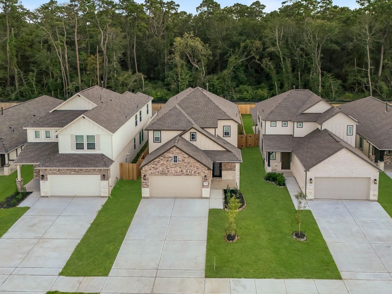 Front exterior of a new home in Cypresswood Landing, Humble, TX, highlighting curb appeal (Image 2). Front exterior of a new home in Cypresswood Landing, Humble, TX, highlighting curb appeal (Image 2).