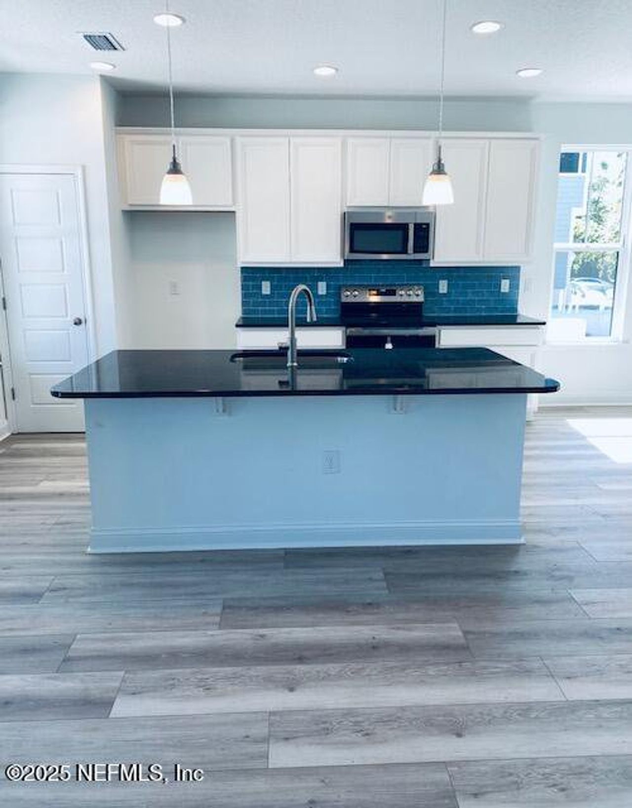 Furnished interior view inside a new home in , Jacksonville (Image 2).