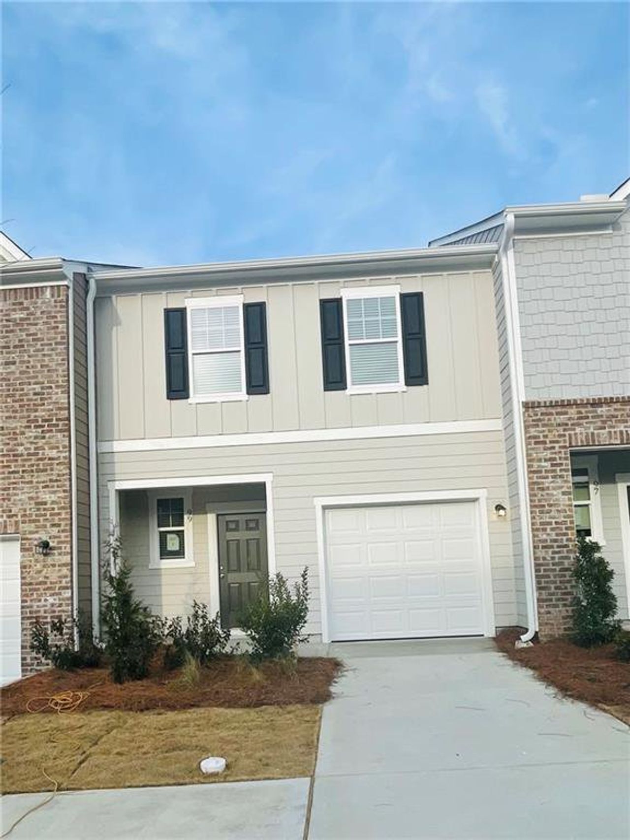 Front exterior of a new home in Rivington Walk, Winder, GA, highlighting curb appeal (Image 2).