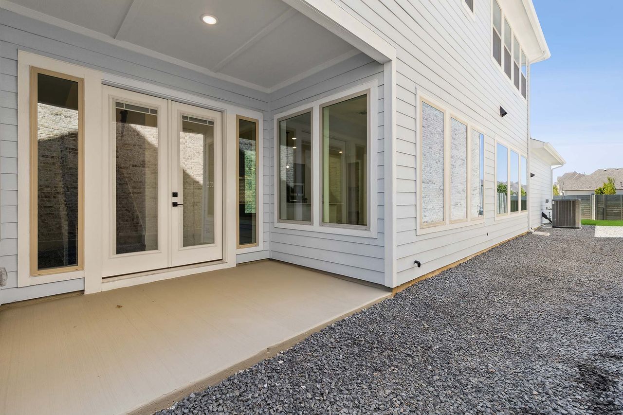 Image 2 representing the The Laurinda by David Weekley Homes in The Retreat at Harvest, Argyle, TX.