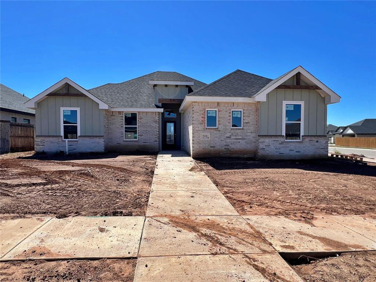 Elevation Sample photo of previous build.  Final property finishes and colors will vary