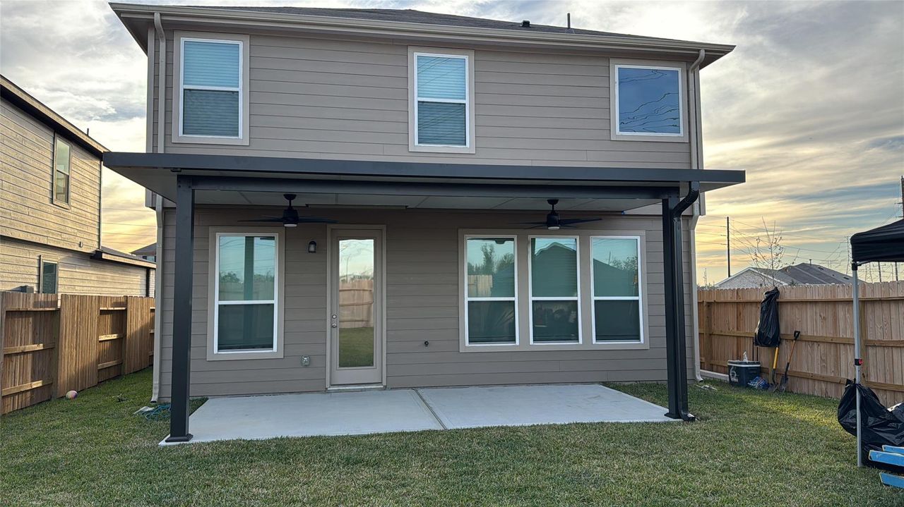 Exterior details and patio area of a home in , Arcola (Image 2).