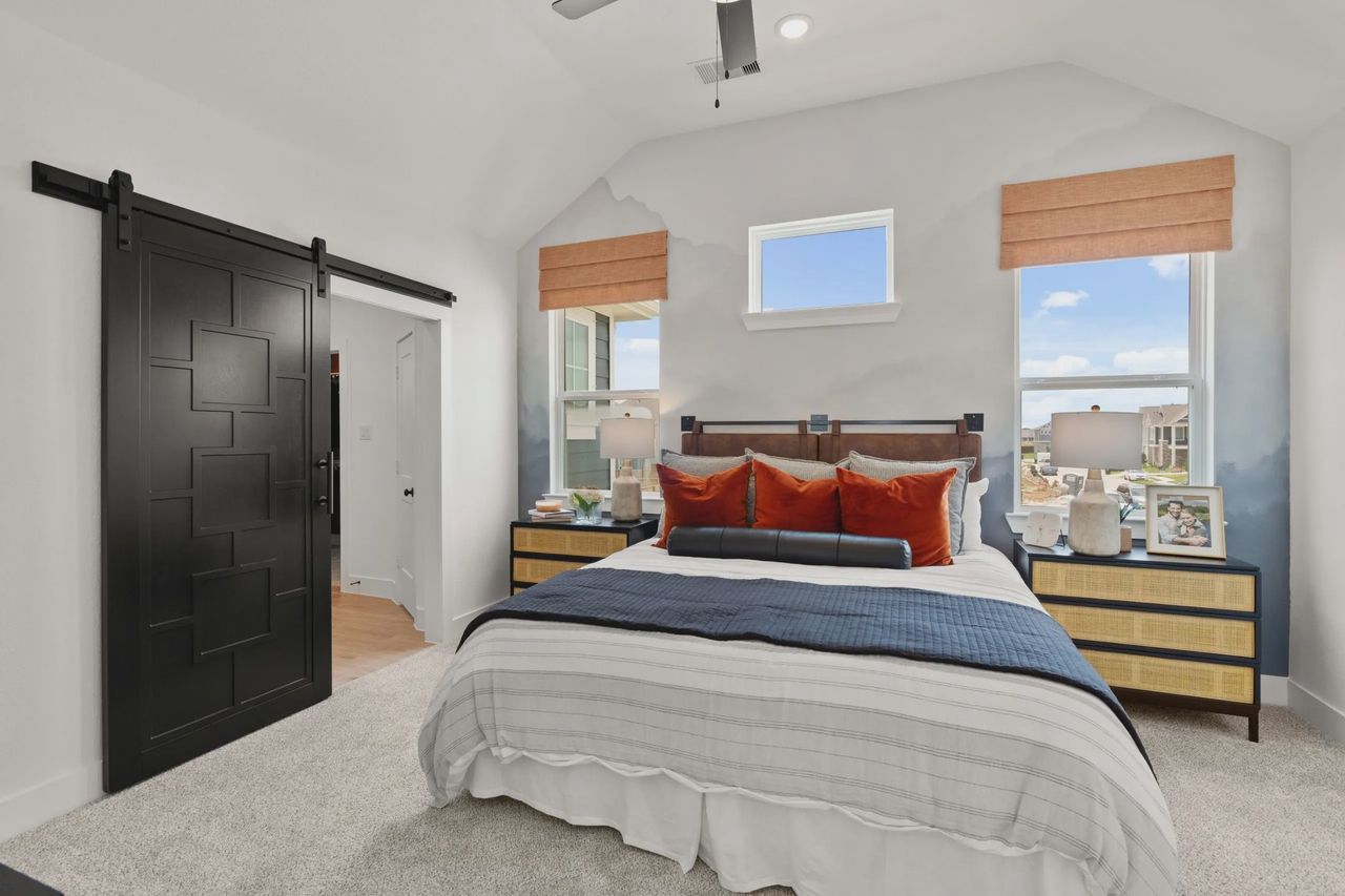 Furnished interior view inside a new home in Meridiana Courtyard Collection, Iowa Colony (Image 2).