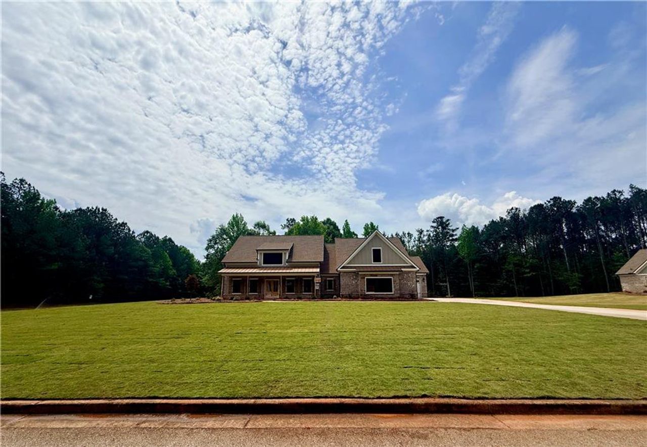 Front exterior of a new home in St. Regis, Oxford, GA, highlighting curb appeal (Image 2).