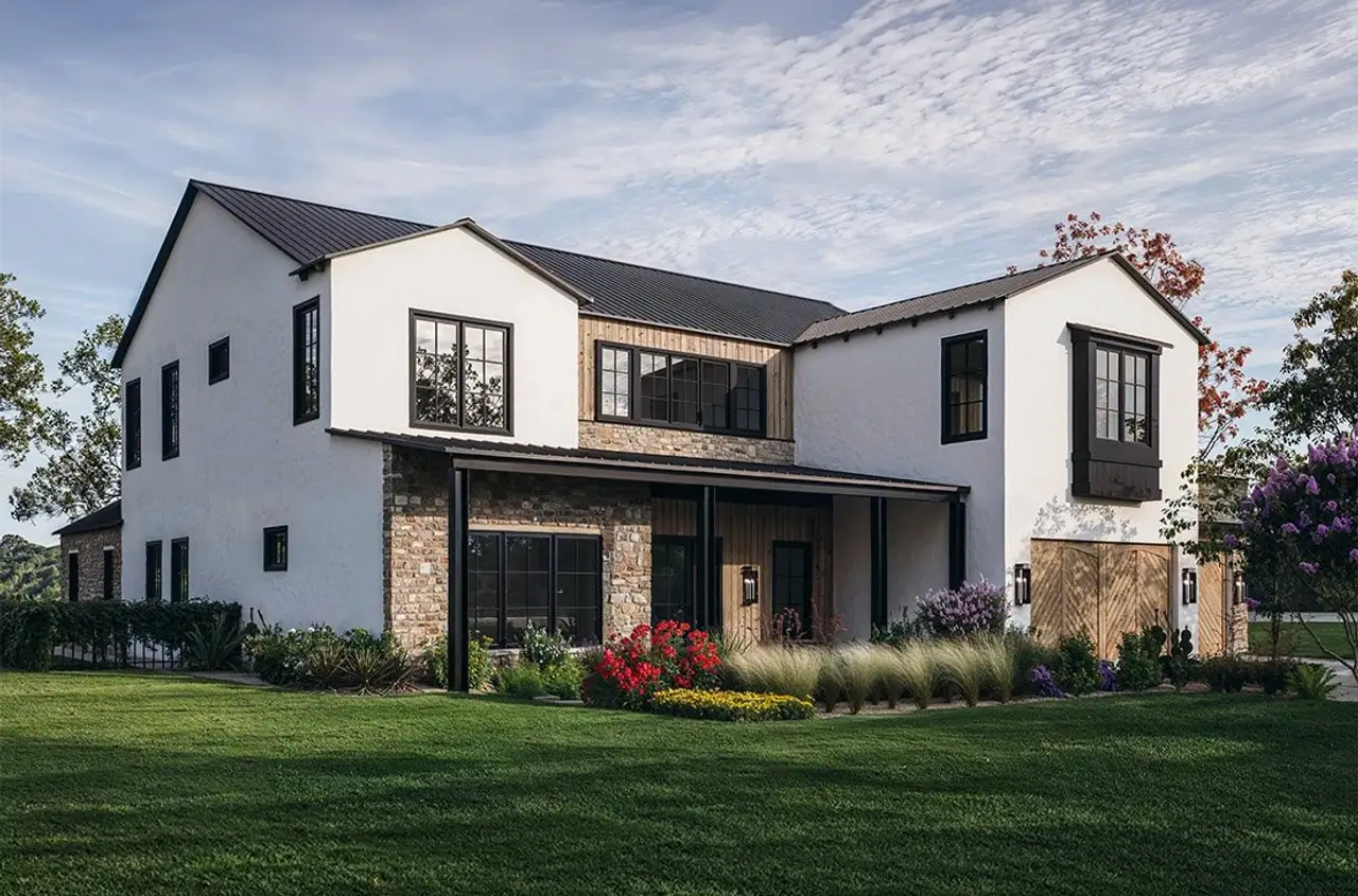 Representative exterior photo of a completed home built from the Vista by Milestone Community Builders in The Overlook at Westlake, Austin, TX (Image 2). Representative exterior photo of a completed home built from the Vista by Milestone Community Builders in The Overlook at Westlake, Austin, TX (Image 2).