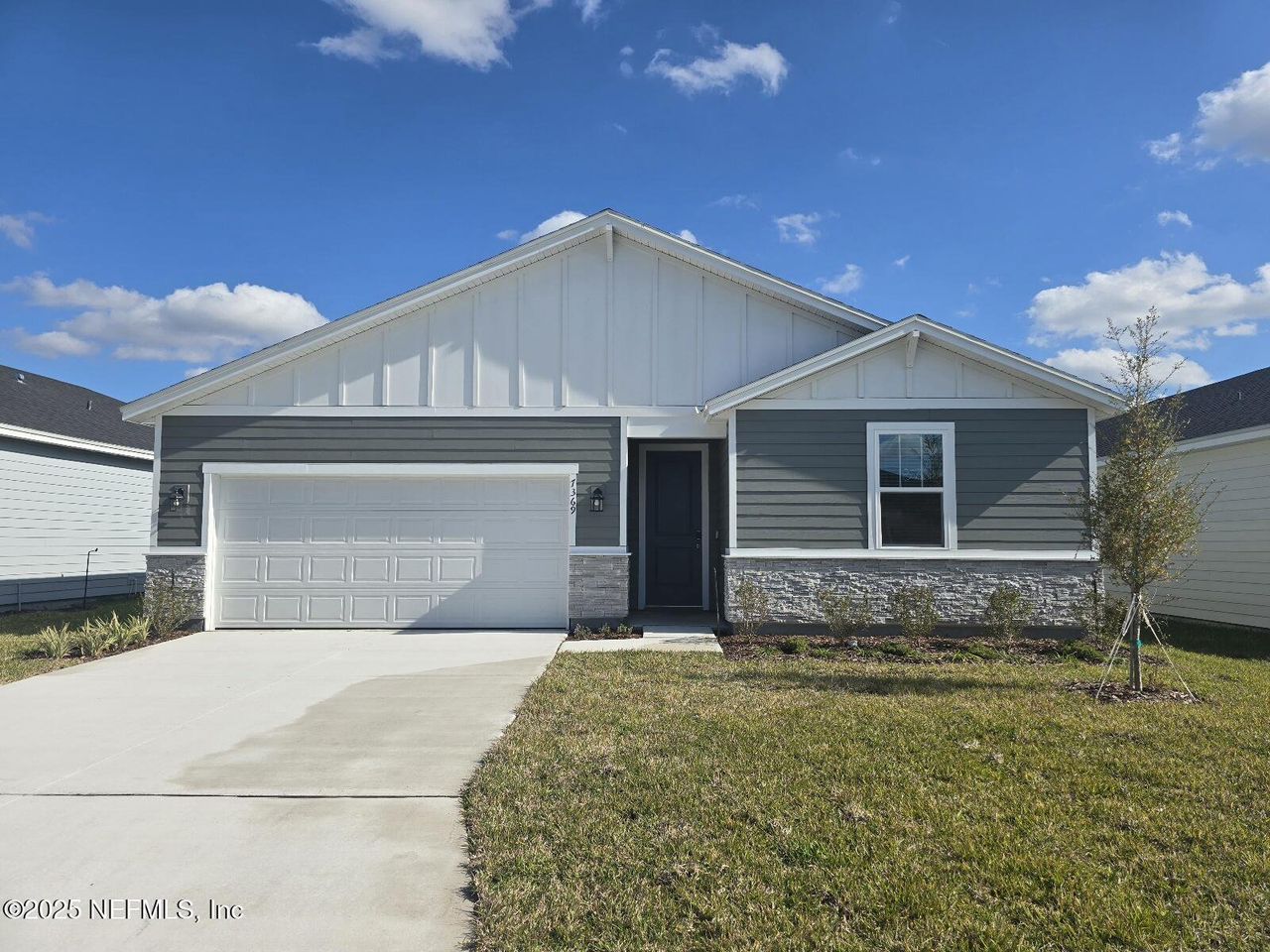 Front exterior of a new home in Cypress Meadows - Signature Series, Jacksonville, FL, highlighting curb appeal (Image 2).