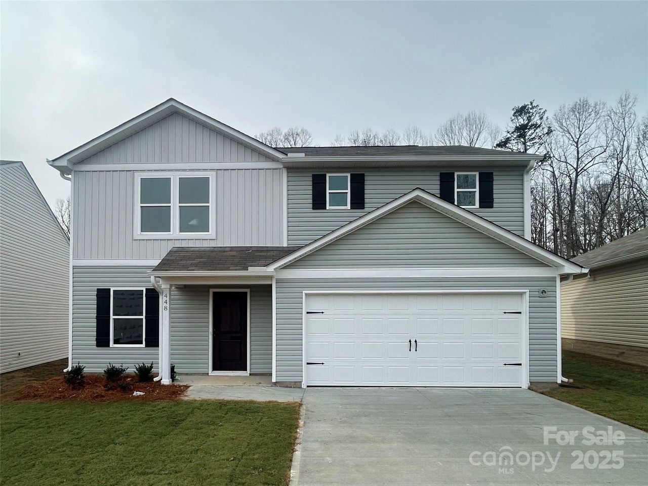 Front exterior of a new home in Riverdale Hills, Spartanburg, SC, highlighting curb appeal (Image 2).