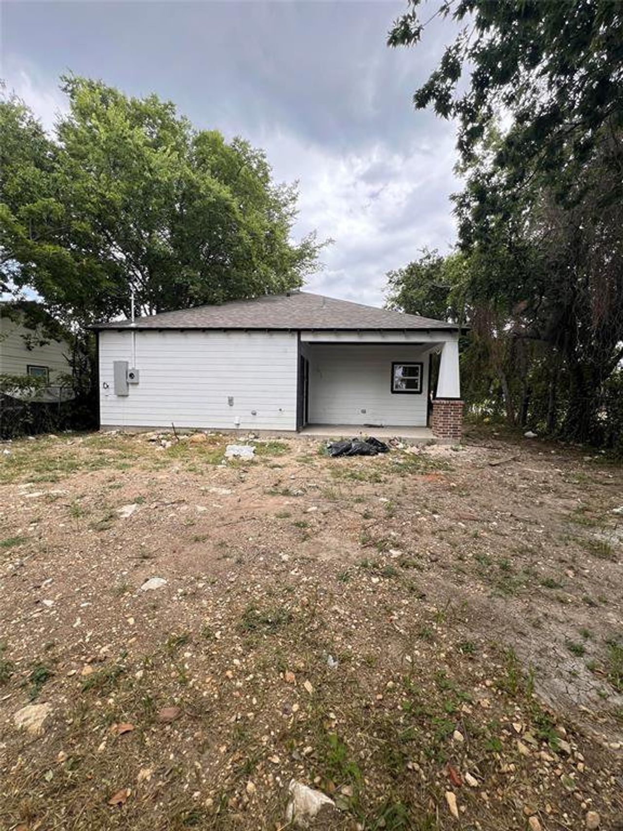 Back Covered Porch and Storage Closet. The backyard will include sod.