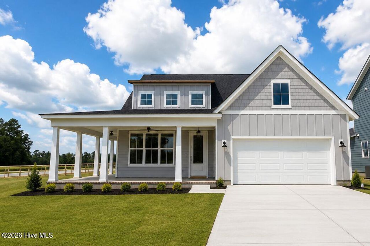 Front exterior of a new home in East Lake, Leland, NC, highlighting curb appeal (Image 2).