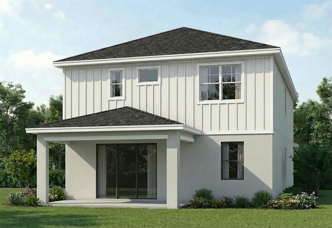 Front exterior of a new home in , Orlando, FL, highlighting curb appeal (Image 2).