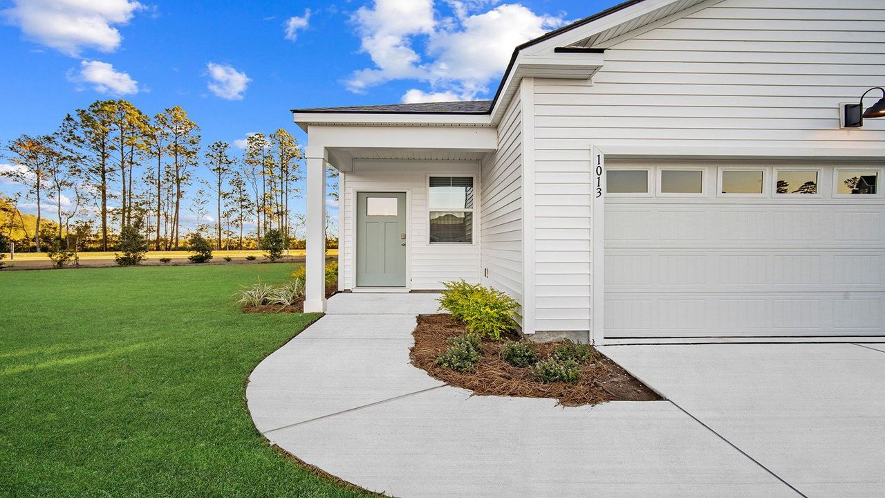Exterior details and patio area of a home in The Lakes at North Glynn, Brunswick (Image 2).