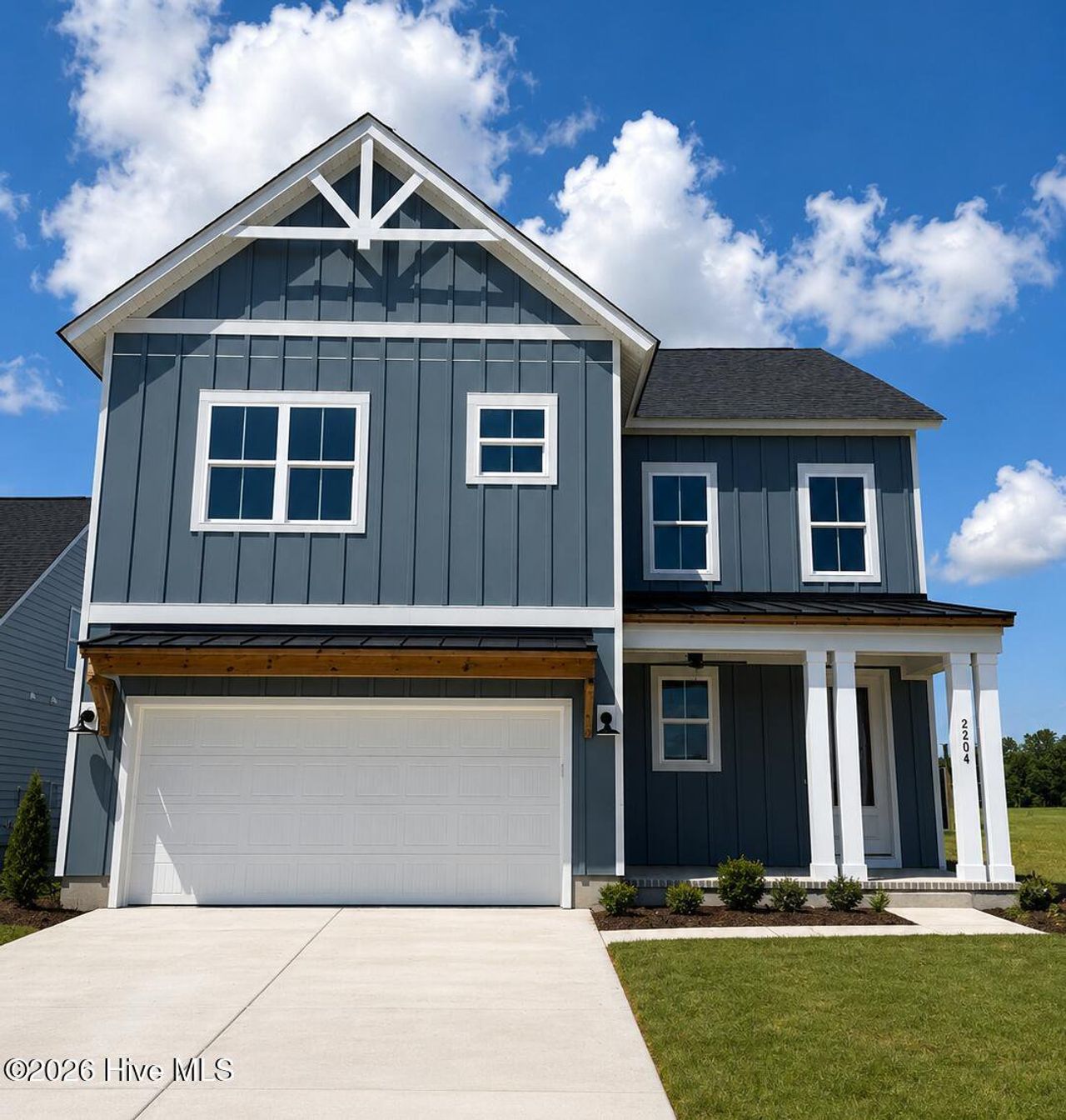 Front exterior of a new home in East Lake, Leland, NC, highlighting curb appeal (Image 2).