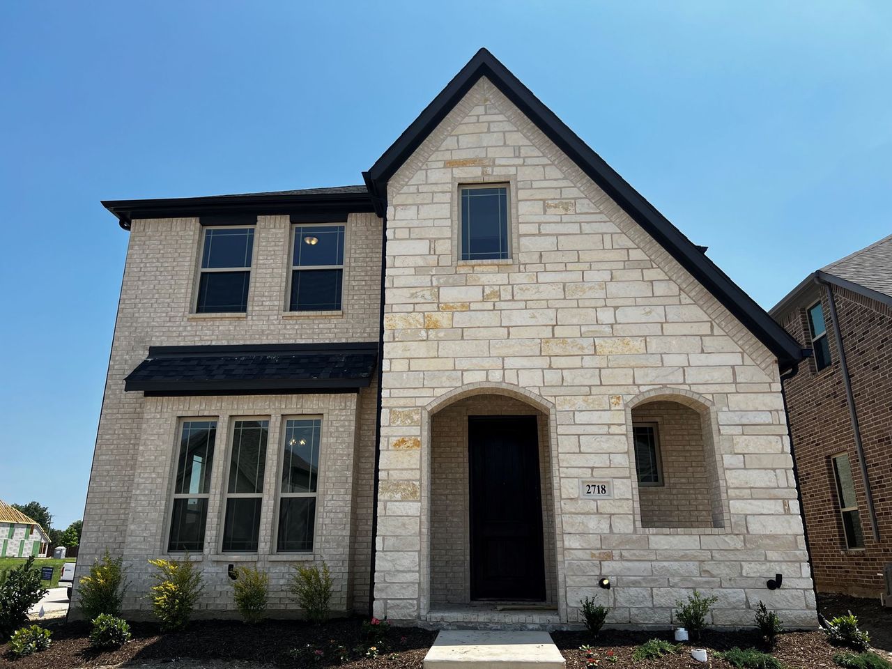 Representative exterior photo of a completed home built from the Telluride by Windsor Homes in Walton Ridge, Corinth, TX (Image 2).