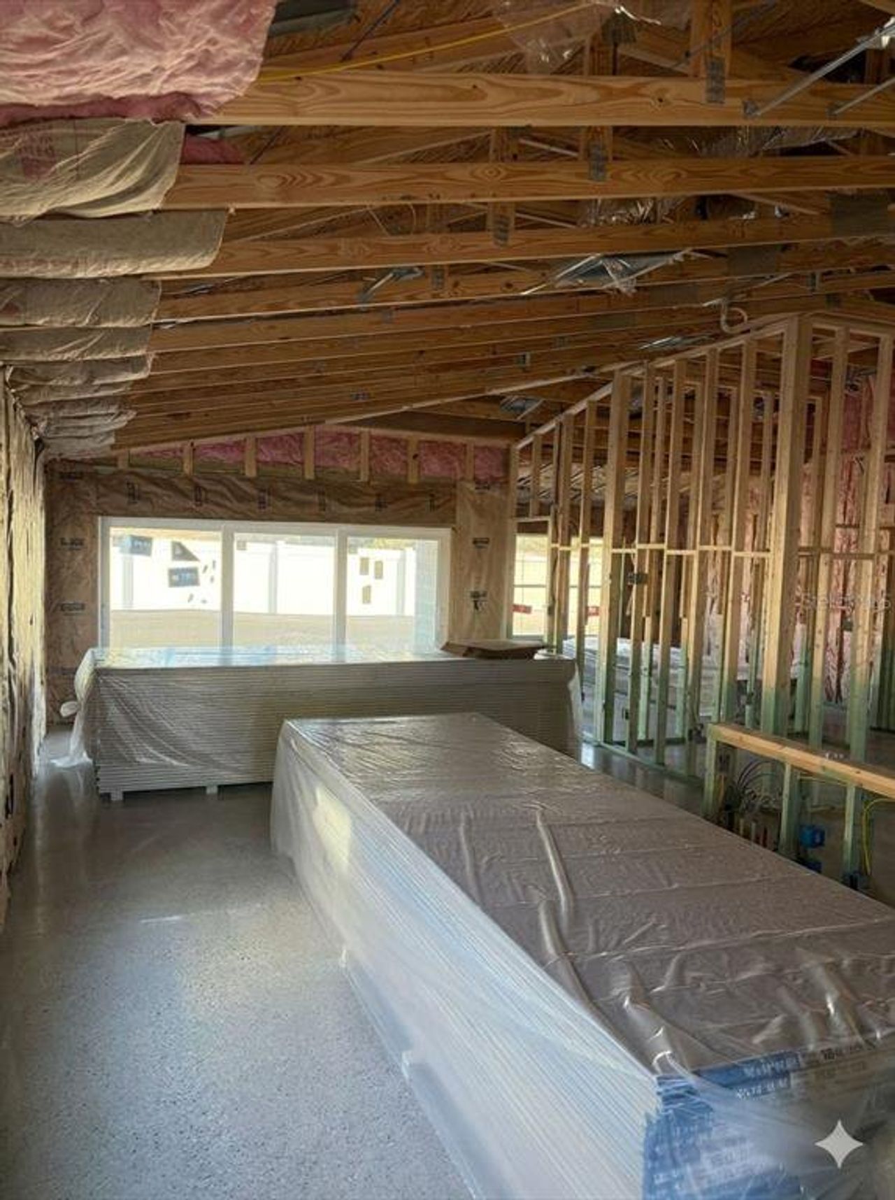 In-progress construction of a new home in Crosswind Point, Parrish, FL (Image 2).