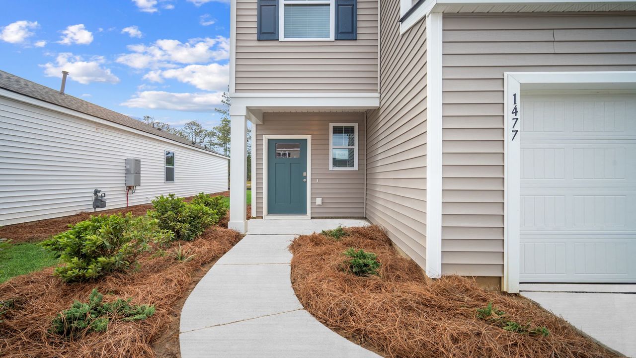 Exterior details and patio area of a home in The Retreat at East Argent, Ridgeland (Image 2).