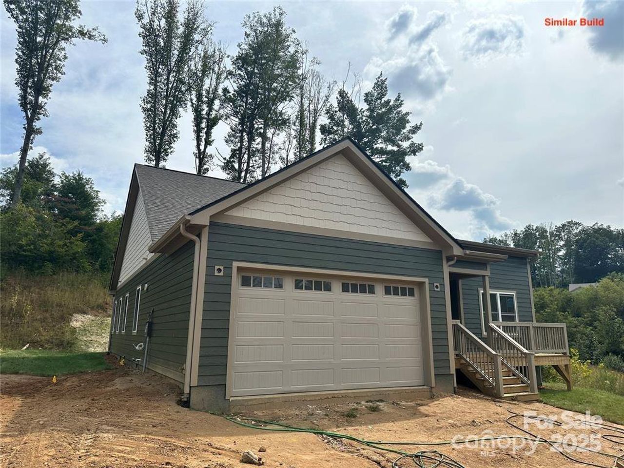Front exterior of a new home in , Weaverville, NC, highlighting curb appeal (Image 2). Front exterior of a new home in , Weaverville, NC, highlighting curb appeal (Image 2).