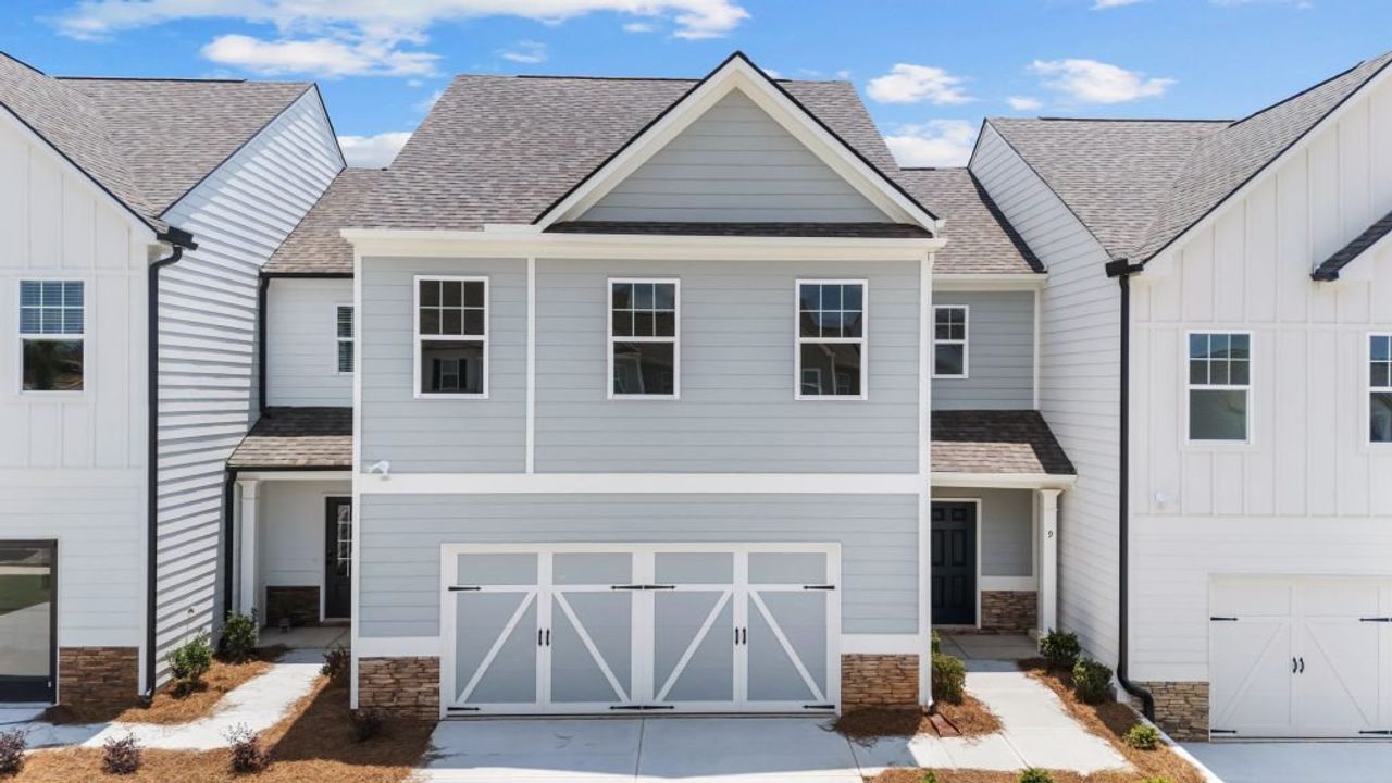 Front exterior of a new home in The Retreat at Browns Ridge, Newnan, GA, highlighting curb appeal (Image 2).