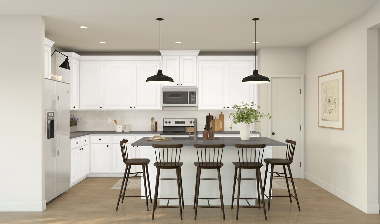 Kitchen with vast island & pendant lights Kitchen with vast island & pendant lights