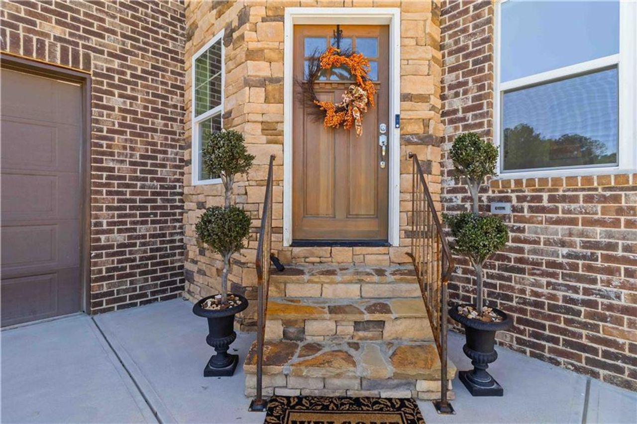 Exterior details and patio area of a home in , Atlanta (Image 2). Exterior details and patio area of a home in , Atlanta (Image 2).