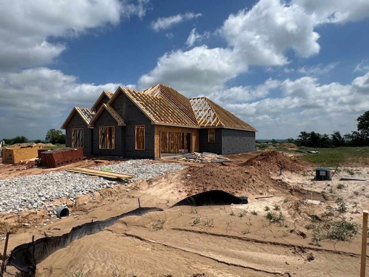 Front exterior of a new home in Stagecoach Crossing, Bridgeport, TX, highlighting curb appeal (Image 2).