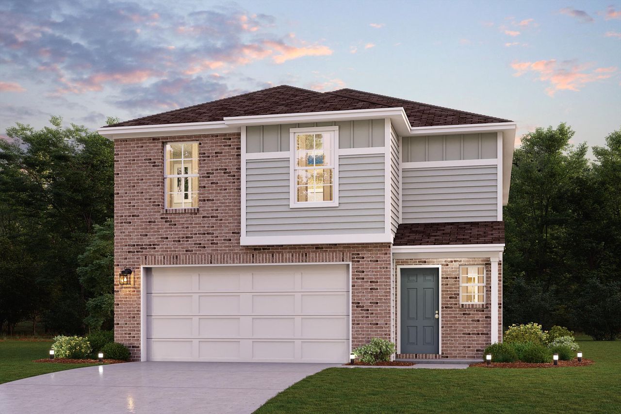 A house with a garage with Greersburg Academy in the background.