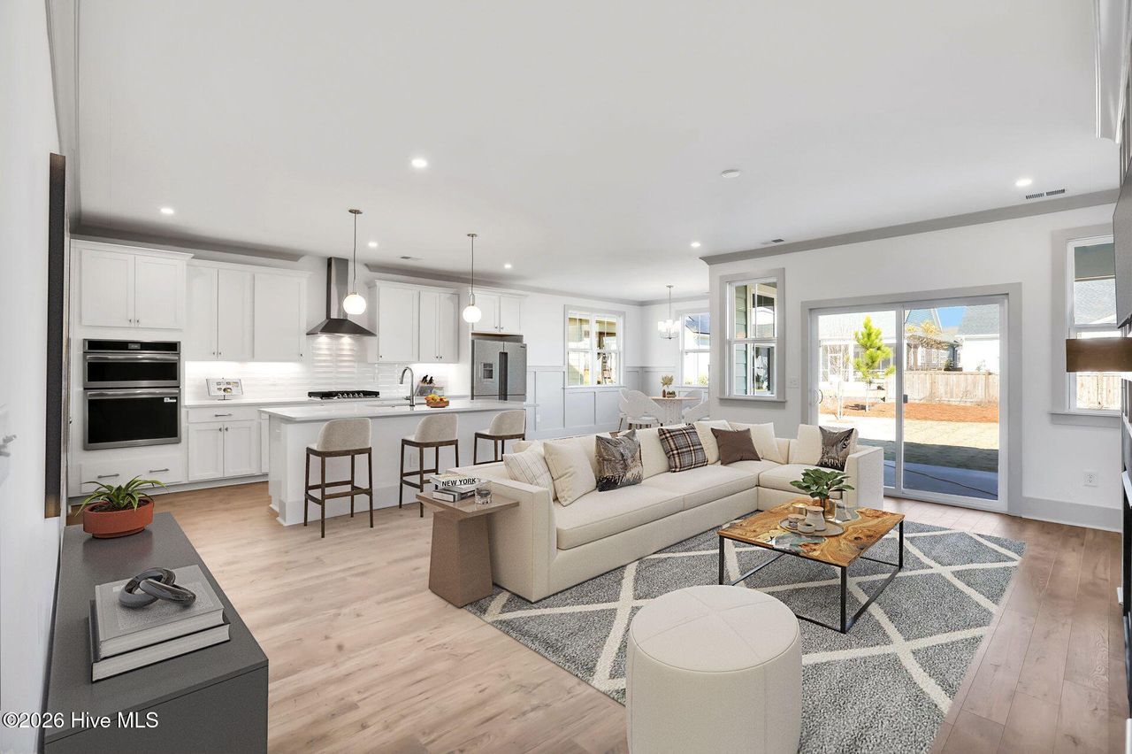 Furnished interior view inside a new home in East Lake, Leland (Image 2).